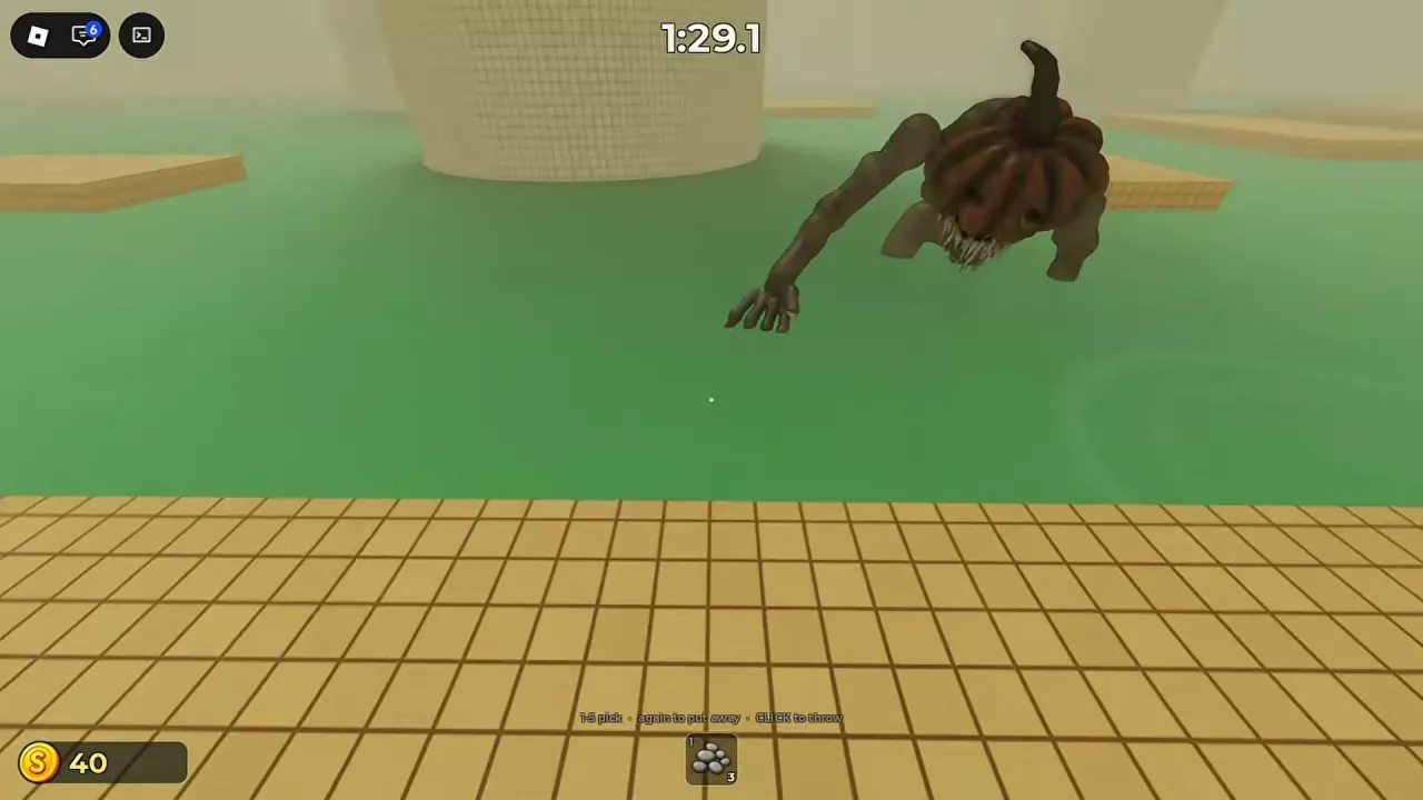 Pumpkin-headed monster approaching the player's platform after a pebble throw near a column.